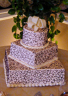 3 tier cake with squiggles