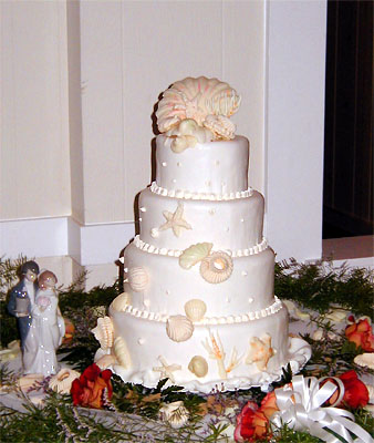 four layer pearlesscent cake with peach shells