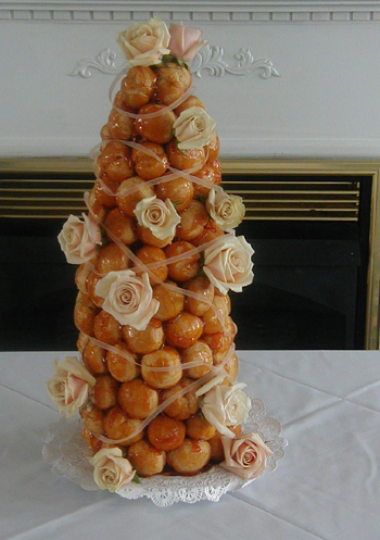 French Croquembouche cream puffs with roses